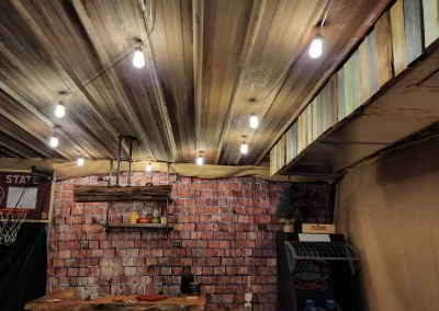corrugated metal basement ceiling with patio lights, interior decor