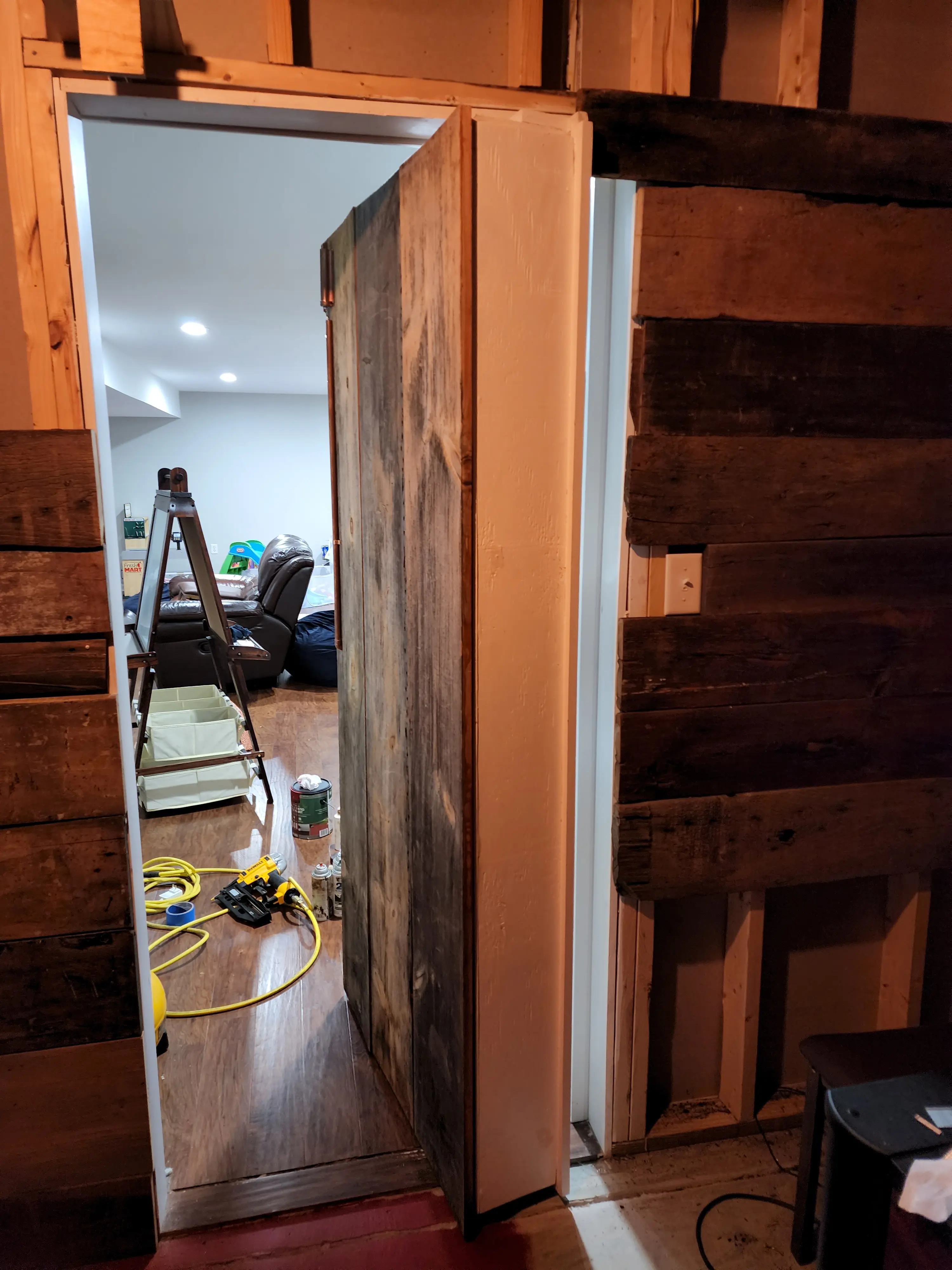 Bookcase Door Progress, rustic speakeasy with barn beam wood, 100 year old wood.