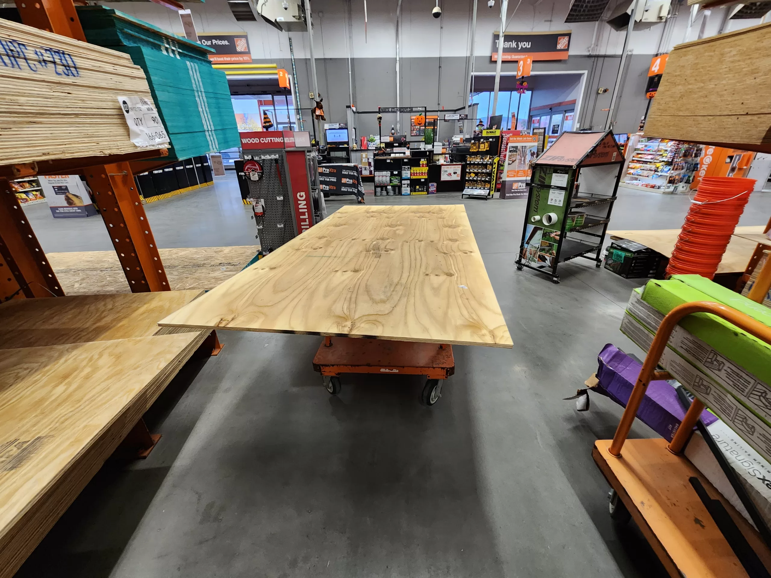22/32 plywood in store, rough cut lumber on cart