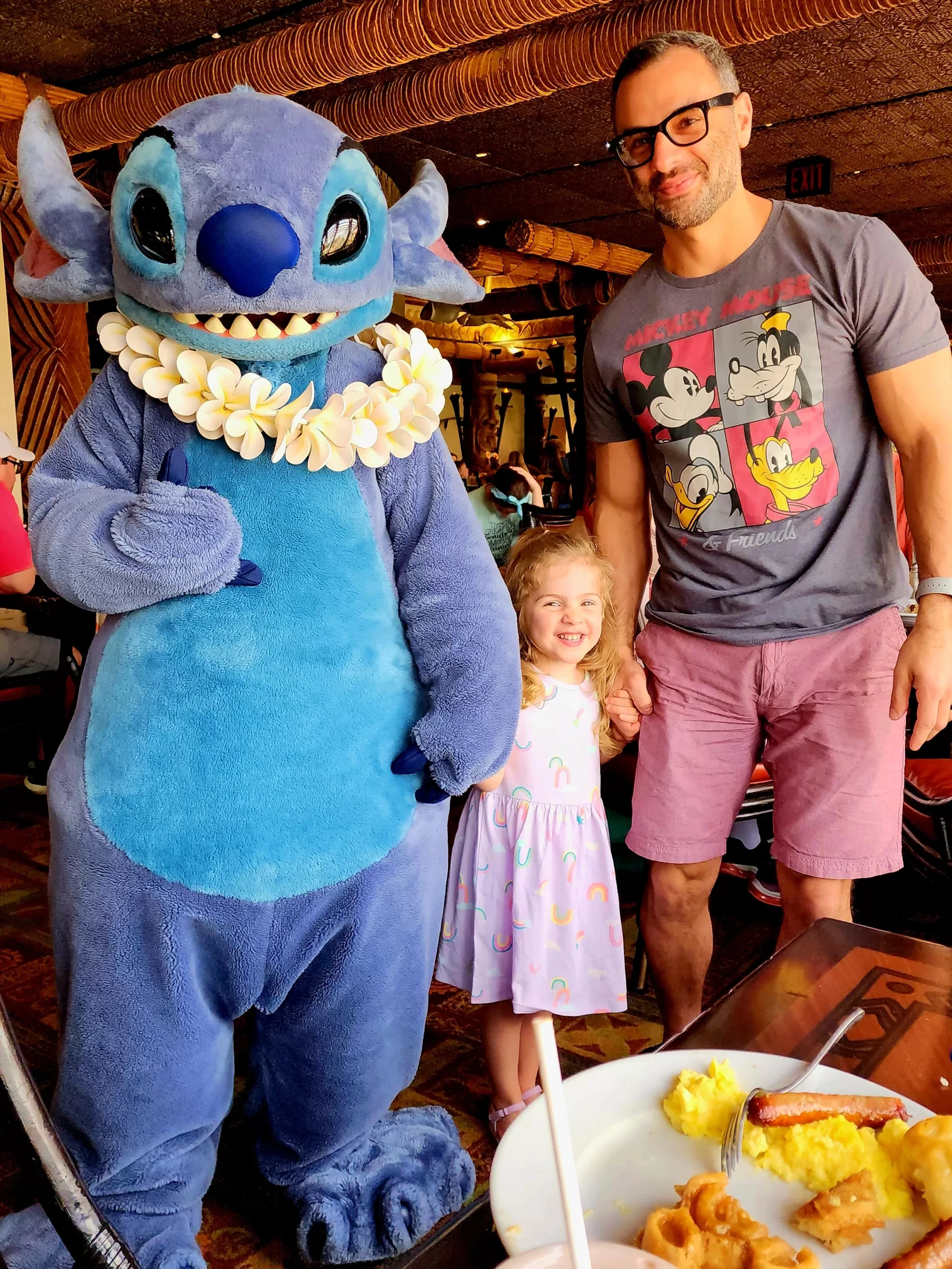 Disneys Stitch with toddler and dad at brunch